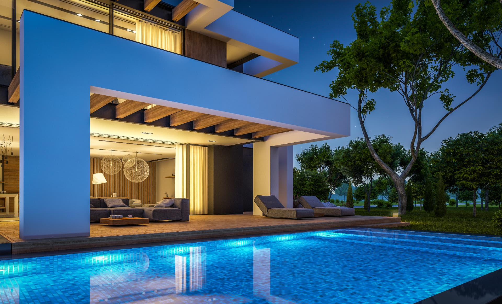 A private Vilamoura villa at dusk, terrace lit and pool still